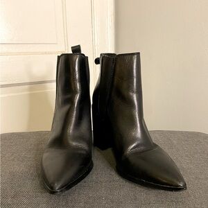 Steve Madden black leather boots.